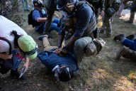Protesters at ICE facility object to barricades, agents detain multiple people
