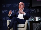 Author sues Melania Trump, saying she threatened $1B suit