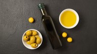 You Should Definitely Be Adding Olive Pits To Your Olive Oil Bottles