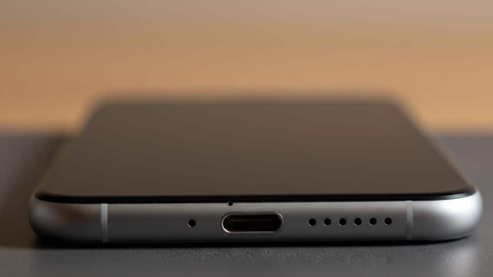 Why Your Smartphone Has That Tiny Hole Next To Charging Port And Its Purpose
