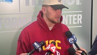 Aidan Hutchinson wears USC hoodie after losing bet to Amon