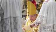 American cardinal celebrates old Latin Mass in St. Peter's in a sign of change