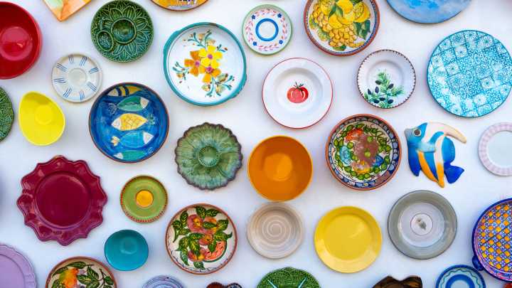 Put Your Favorite Dishes On Display By Repurposing An Old Towel Bar