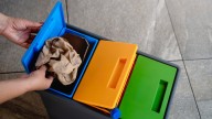 Save Valuable Garage Space With This Clever Tip For Your Recycle Bins