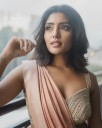 Eesha Rebba Sets the Balcony on Fire in Blush Drapes