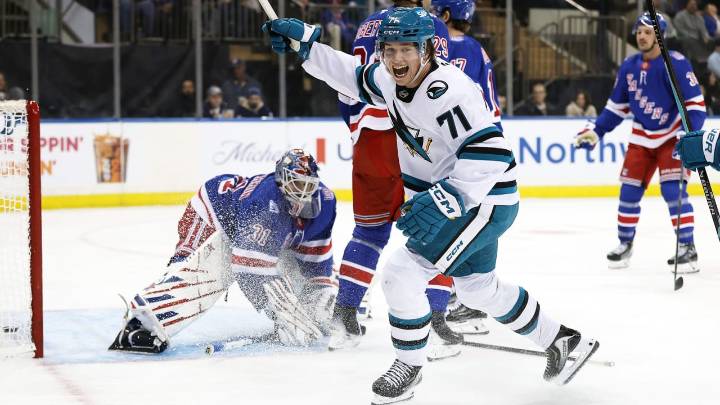 Celebrini gets hat trick, 5 points, Sharks defeat Rangers in OT for 1st win