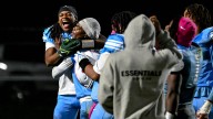 Four downs from Everett football edging Holt on late touchdown