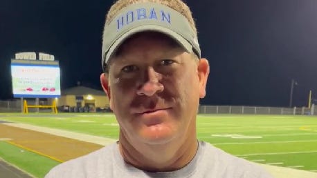 Hoban Knights football coach Tim Tyrrell