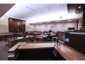 Fraud suspect's bail revoked to prevent him delaying his trial
