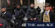 Louvre heist: Mystery man in photograph sparks online speculation