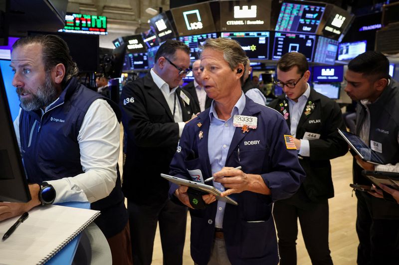 Stocks climb to record, dollar edges down on US