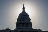 AP reader question: What if essential federal workers don’t show up for work?