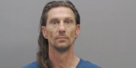 Violent suspect out on bond attacks same victim again, barricades in home, police say