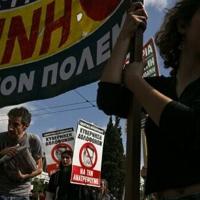 Greece lawmakers back plan to allow 13