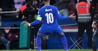 Mbappé scores but limps off late in France's World Cup qualifying win. Germany gets boost