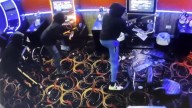 Masked thieves use sledgehammer to steal cash from game machines at lounge