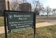 Eastern Michigan ends 35-year deal privatizing parking, settles long legal dispute