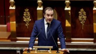 French PM survives no-confidence votes after making pension concession