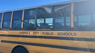 Suffolk crash injures 4 kids in school bus, cement truck collision
