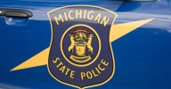 Officials searching for man in water after crash on I