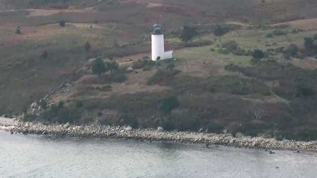 3 people who jumped from burning boat rescued after being stranded on Mass. island