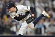 Schlittler strikes out 12 in postseason debut as Yankees beat Red Sox 4