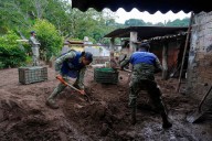 Torrential rains, flooding leave at least 64 dead, 65 missing in Mexico