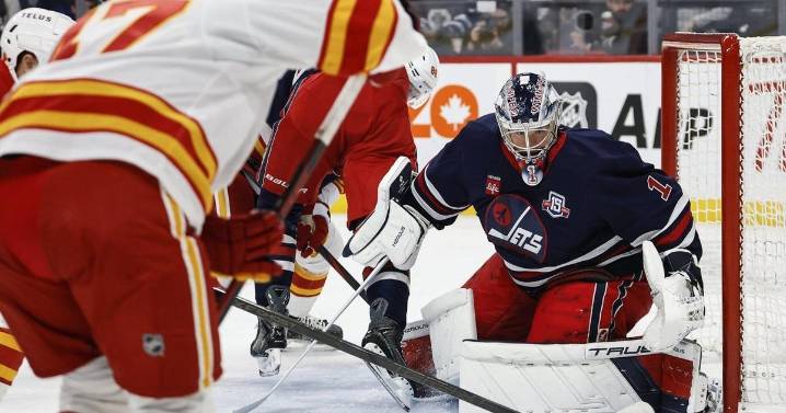Jets use power play to soar past Flames 5