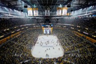 Fan suffers life-threatening injuries after falling from upper level during NHL game