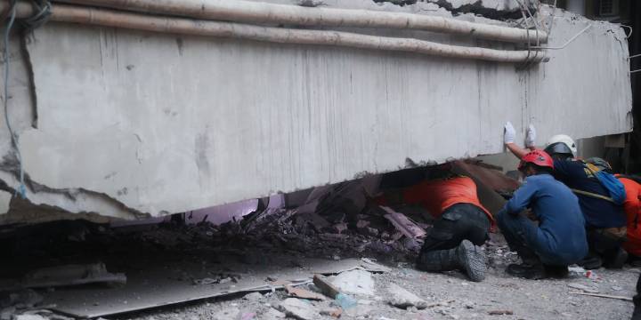 Indonesian rescue workers ‘racing against time’ in search for dozens in rubble of collapsed school