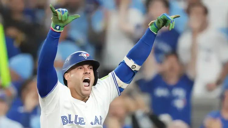 Springer de tres carreras lleva a los Azulejos a la Serie Mundial por primera vez desde 1993