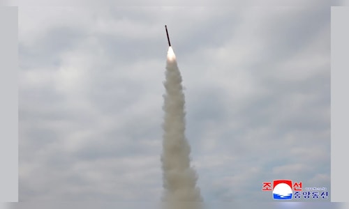 North Korea touts missile tests as Trump visits South Korea