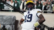 Justice Haynes runs for 152 yards and 2 TDs as No. 25 Michigan beats Michigan State 31