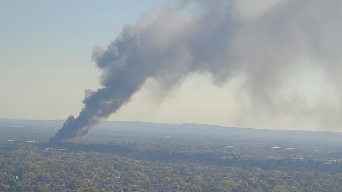 Firefighters battle fire producing large plumes of smoke at southeast Columbus scrapyard