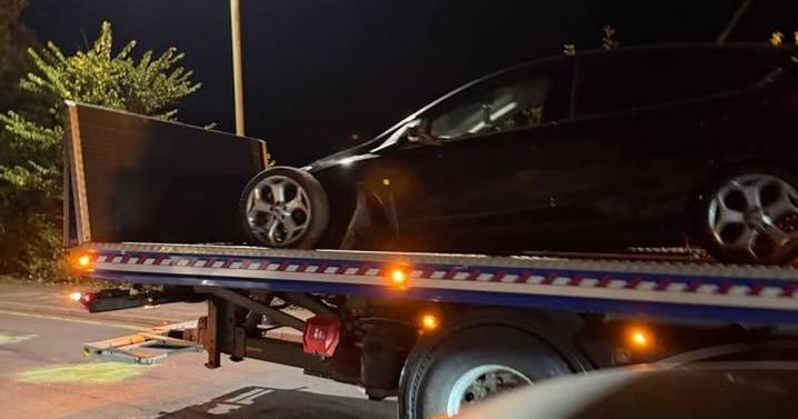 Car smashes into parked vehicle on major Exeter road