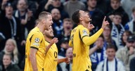 Three Dortmund players involved in bizarre own-goal in Champions League match