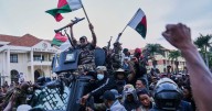 Madagascar president has left the country after soldiers turned against him, lawmaker says