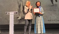 Homenajean a Kim Phuc en congreso ‘Vida después de la vida’