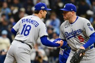 Dodgers’ Yoshinobu Yamamoto reacts to Dave Roberts letting him complete Game 2