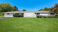 This 1960 Campanelli ranch in Hingham is listed for just under $1M