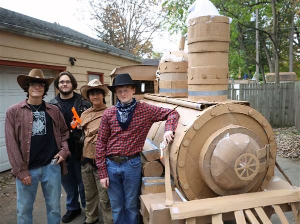 Sylvania school friends engineer a train for Halloween