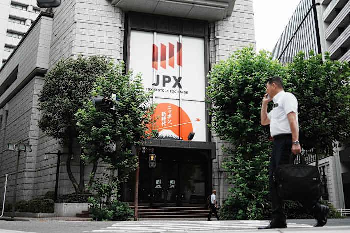 Asian shares are mostly higher after Wall St ends an erratic day with gains