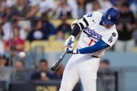 Ohtani hits leadoff homer for Dodgers in playoff opener against Reds