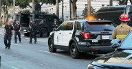 LA City Hall evacuated after car crashes into building's steps and the driver is in police custody