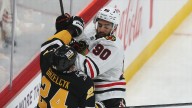 Blackhawks sign defenseman to one