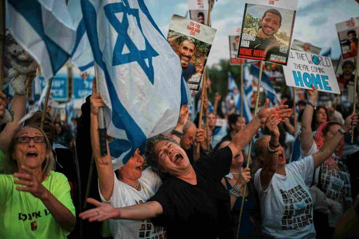 Hamas hands over first seven hostages as part of Gaza ceasefire, says Israel
