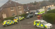 Scots woman attacked by dog outside home as man arrested
