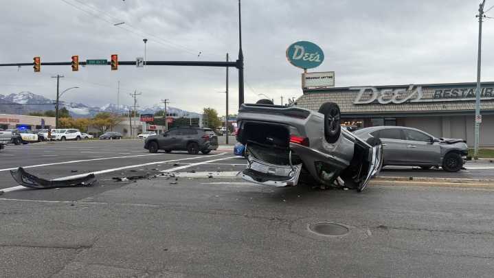 Vehicle rolls onto its hood after crash in Salt Lake City