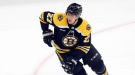 Bruins defenseman heads to dressing room, won’t return