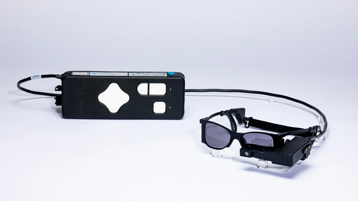 Tiny eye implant, special glasses help some blind patients read